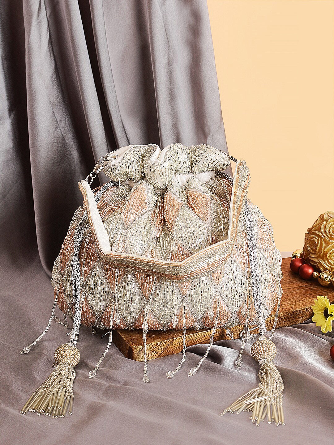 

Swisni Silver-Toned & Peach-Coloured Embellished Potli Clutch