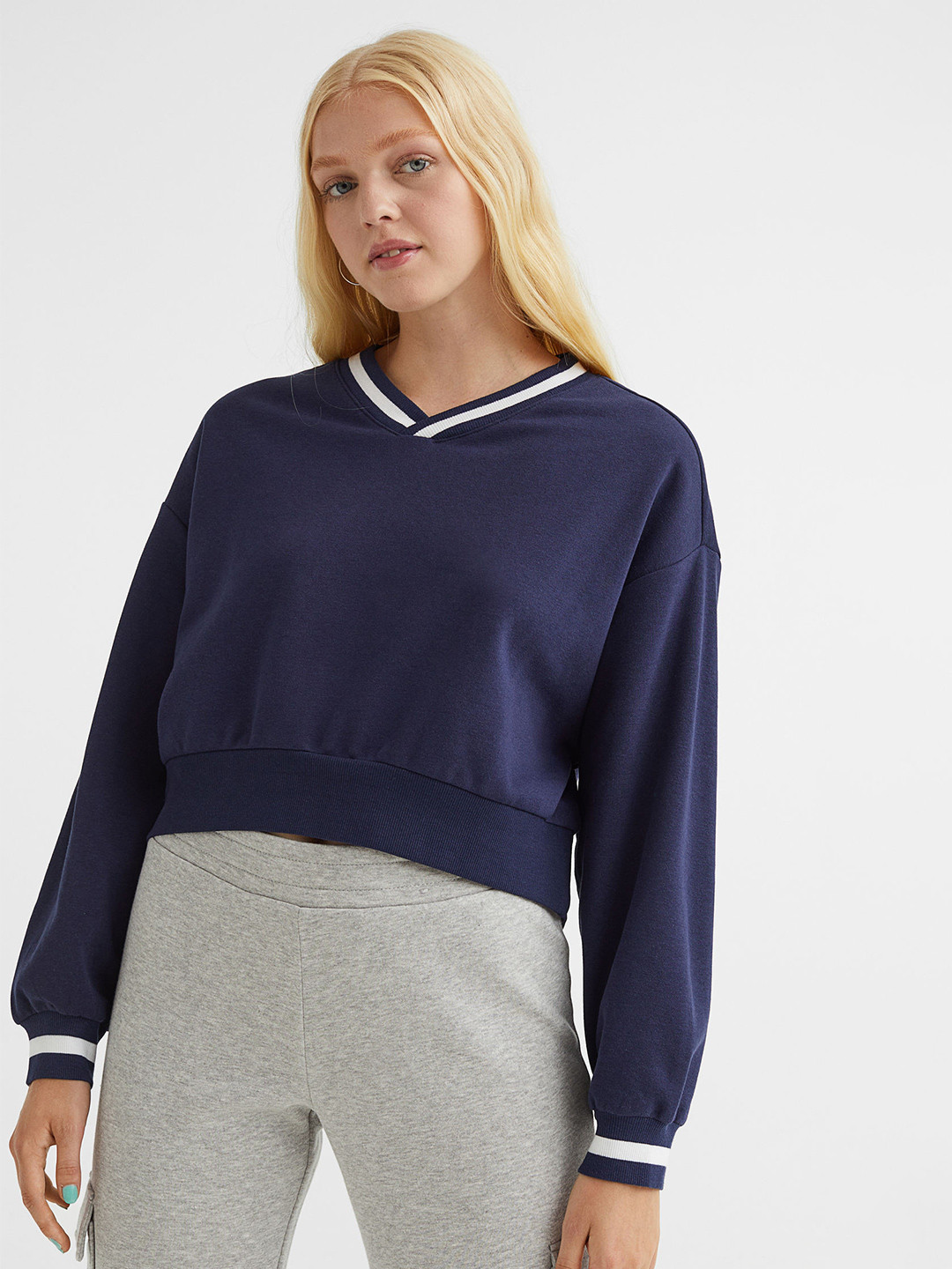 

H&M Women Blue Solid V-Neck Sweatshirt