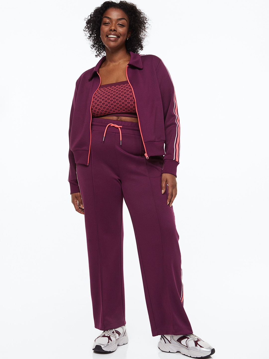 

H&M Women Purple Solid Track Pants with Side Stripes