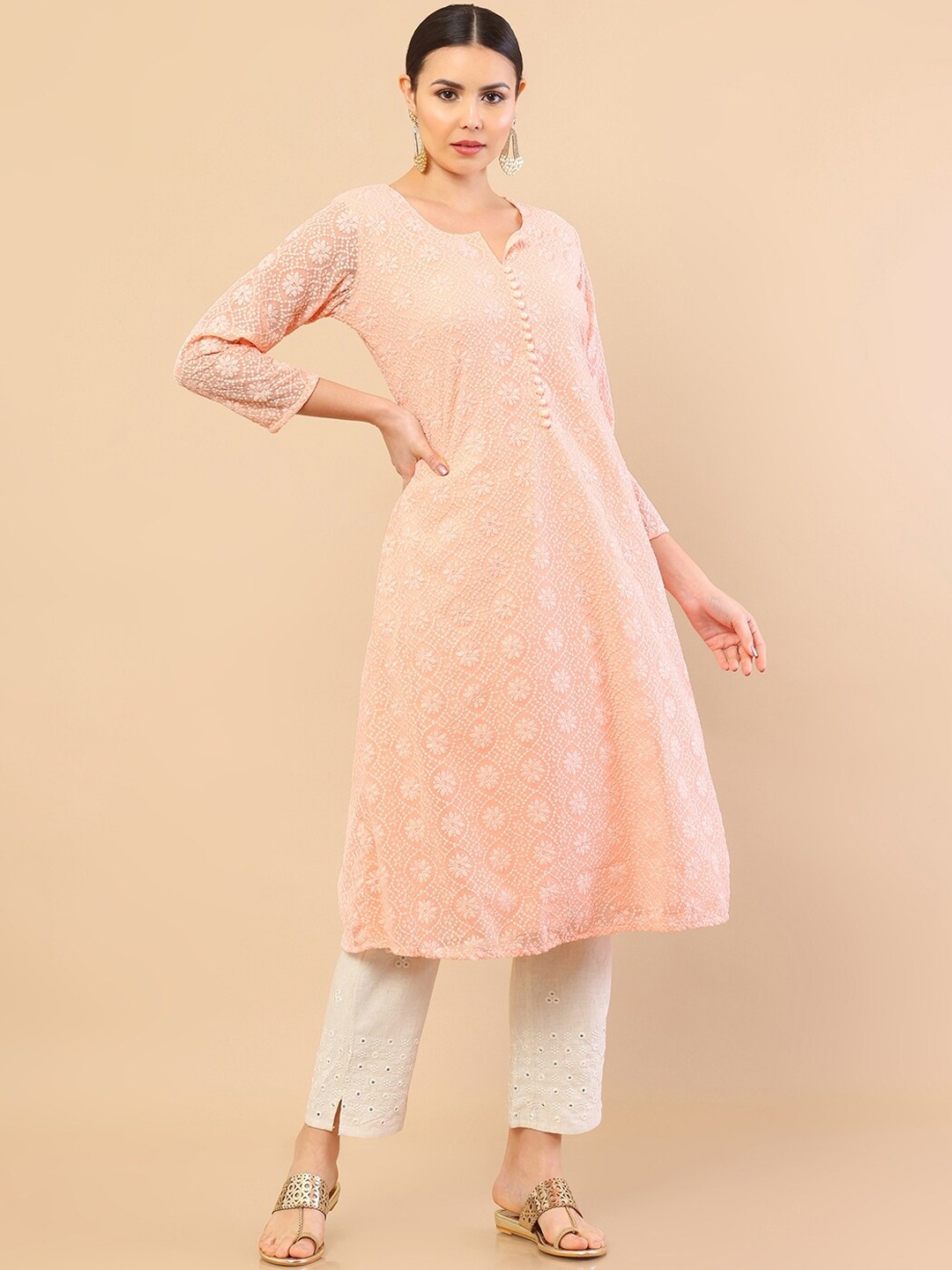 

Soch Women Peach-Coloured Yoke Design Keyhole Neck Cold-Shoulder Sleeves Mirror Work Georgette Anarkali Kurta