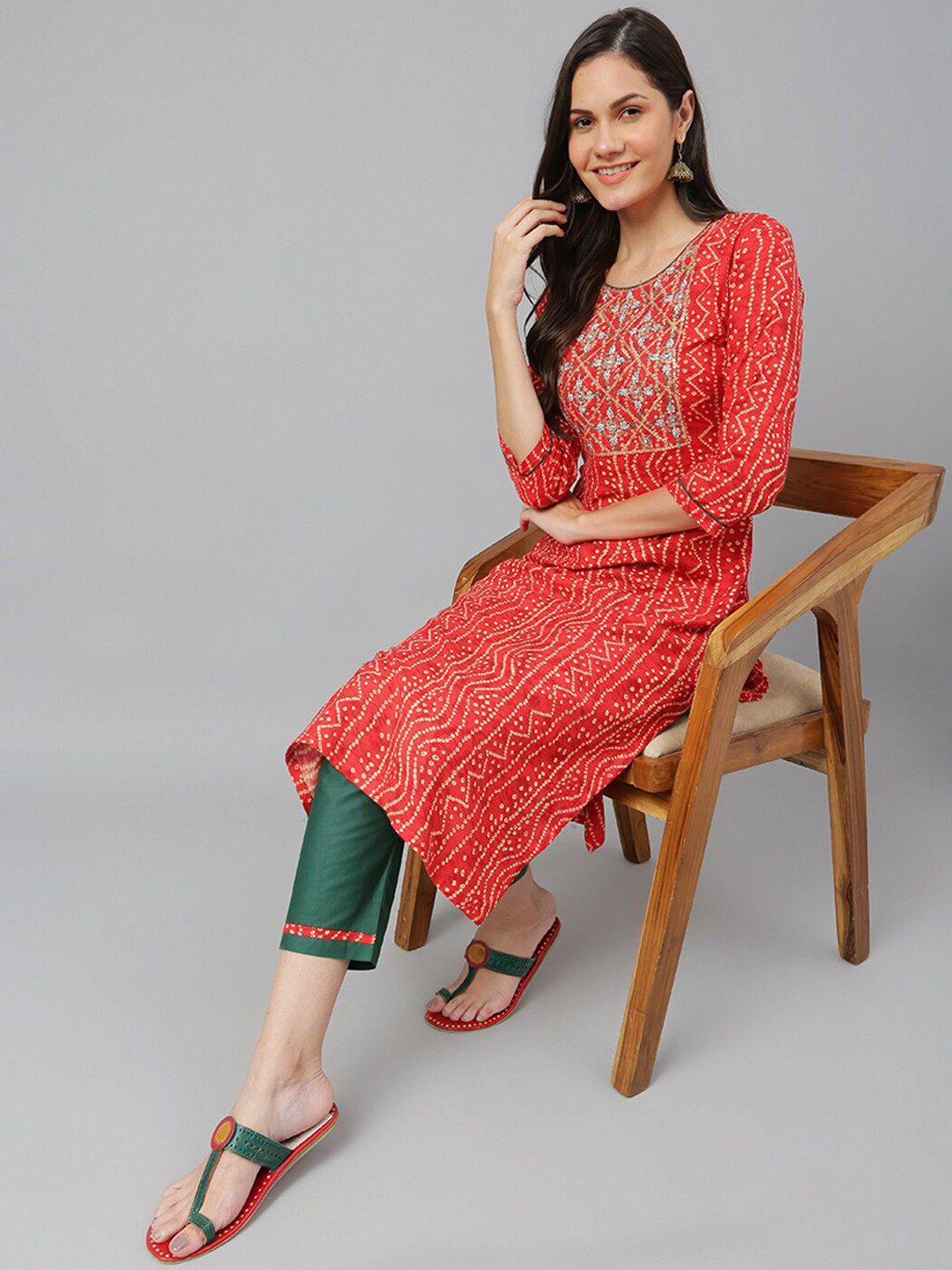 

Kiana House Of Fashion Women Orange Bandhani Printed Kurta with Trousers