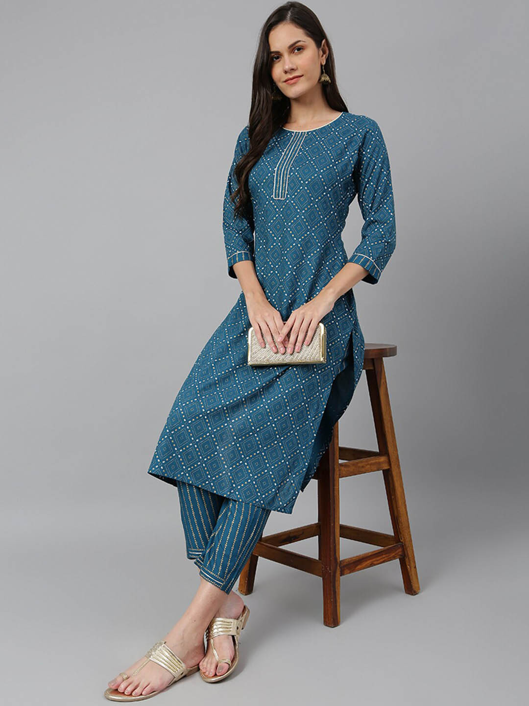 

Kiana Women Blue Printed Kurta with Trousers