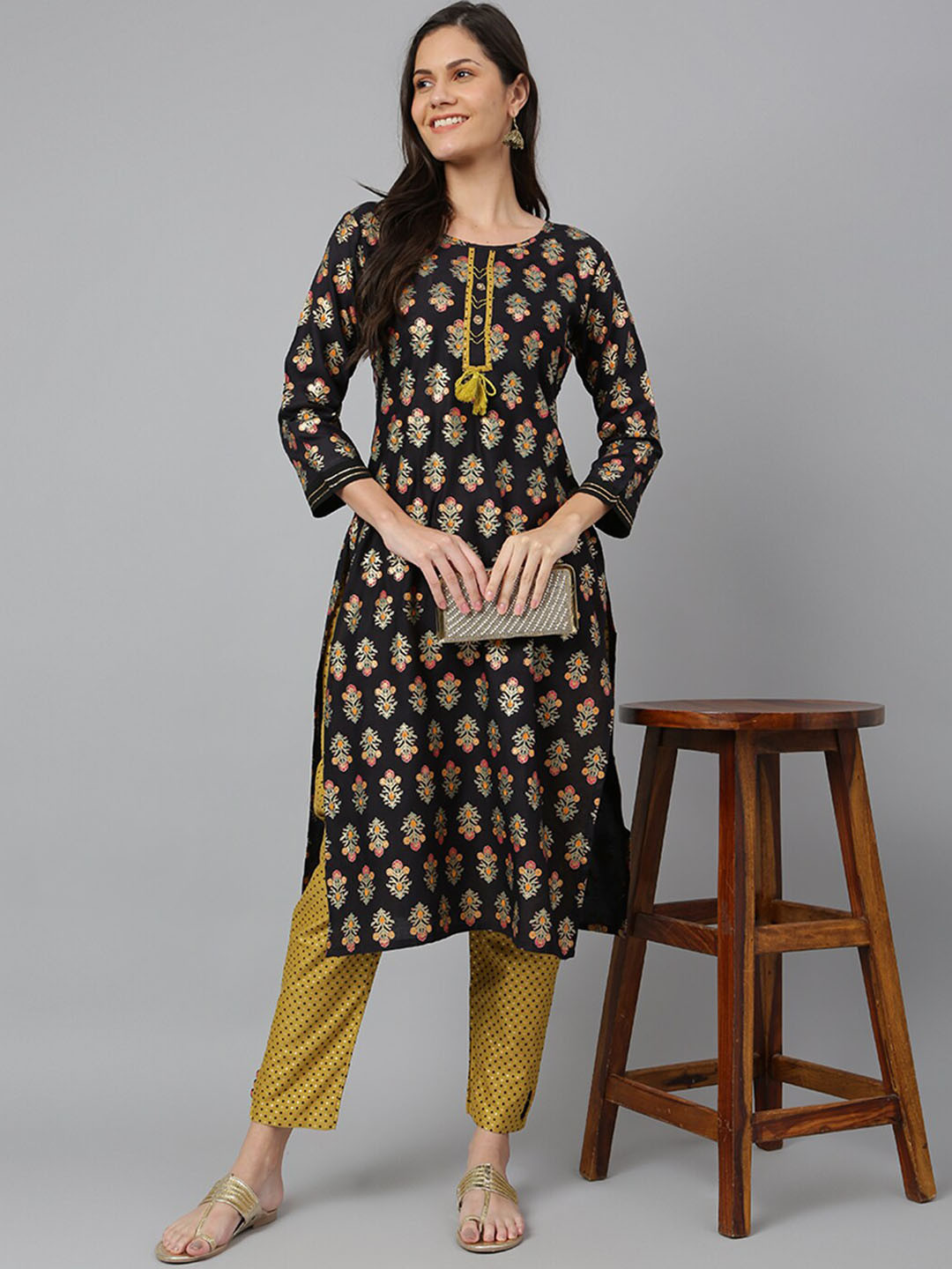 

Kiana Women Black Floral Printed Kurta with Trouser Set