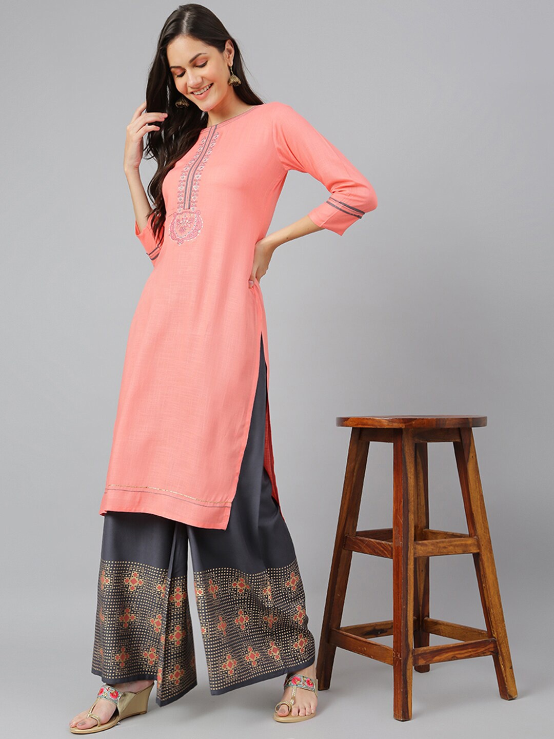 

Kiana Women Peach-Coloured Kurta with Palazzo