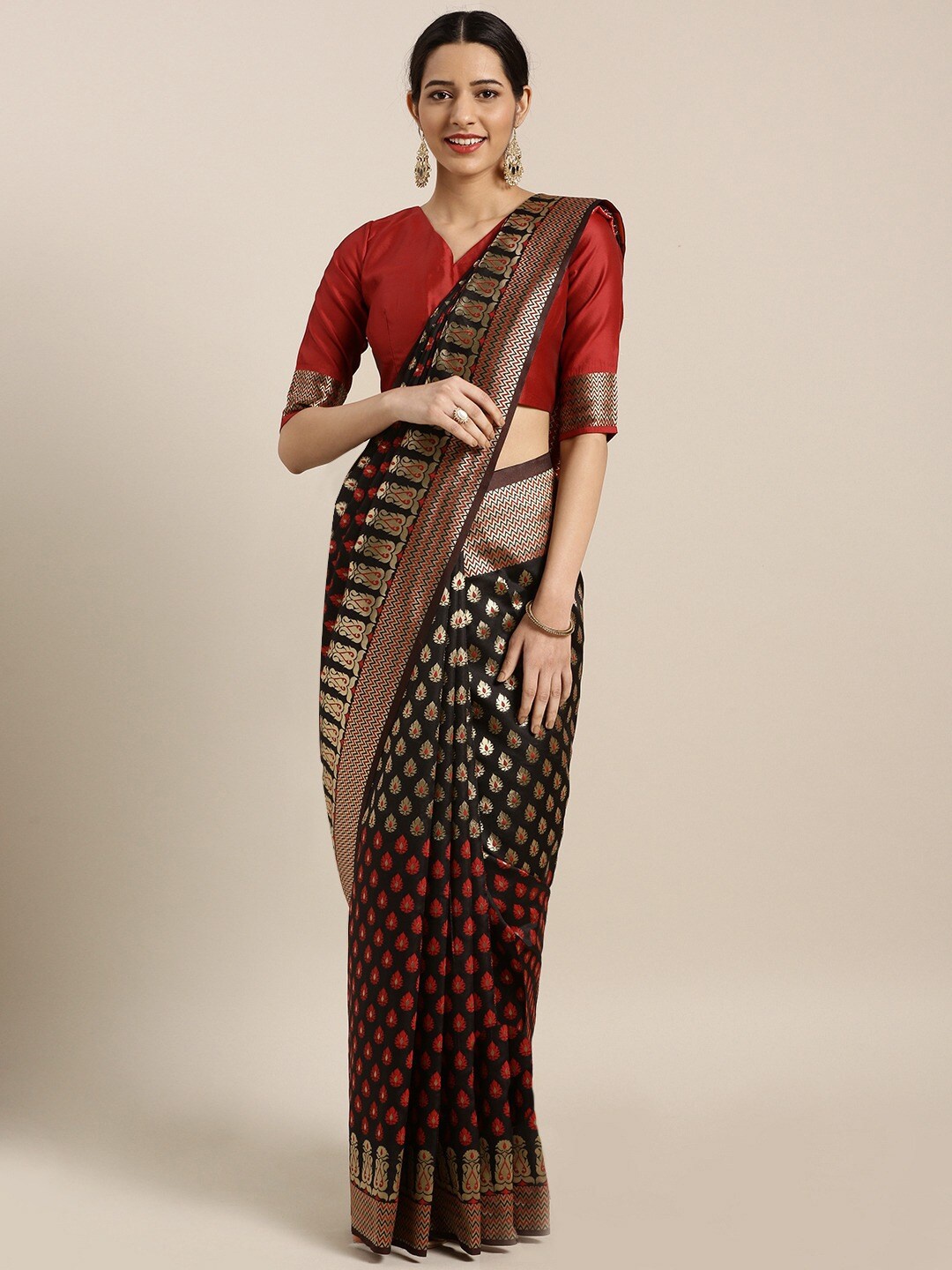 

Shaily Black & Red Ethnic Motifs Zari Silk Blend Saree