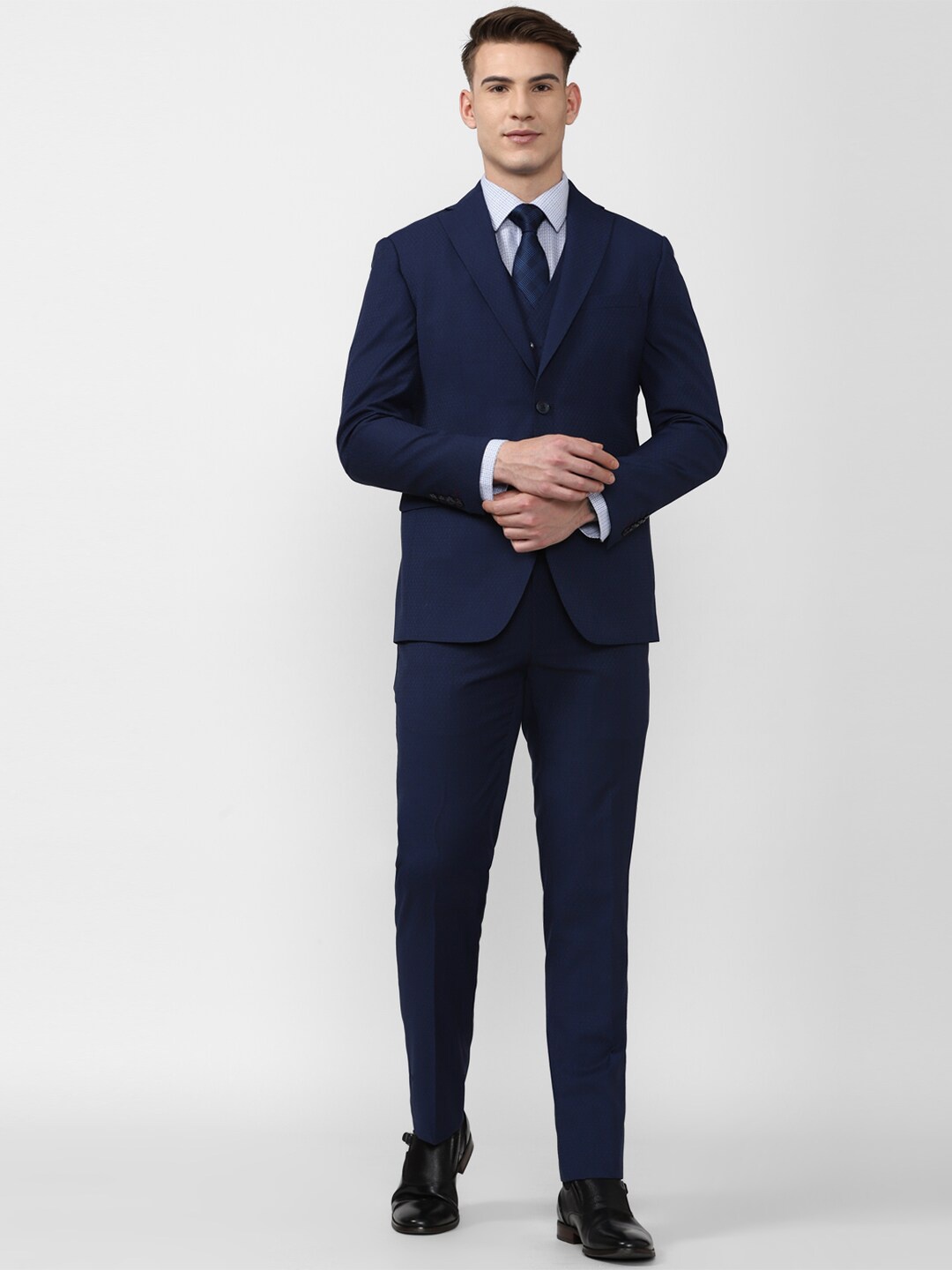 

Peter England Elite Men Navy Blue Self Design Single-Breasted 3 Piece Formal Suits