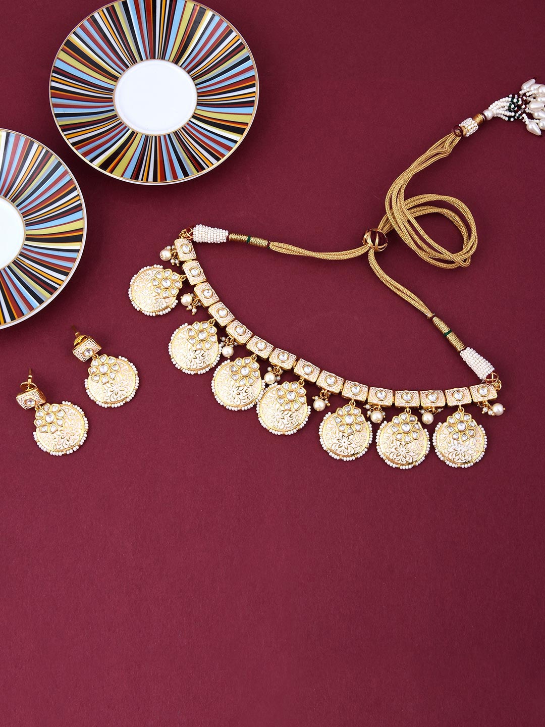 

Tistabene Gold-Plated White Stone-Studded & Beaded Jewellery Set