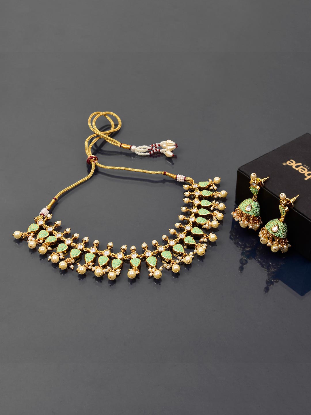 

Tistabene Gold-Plated Green Stone-Studded & Beaded Jewellery Set