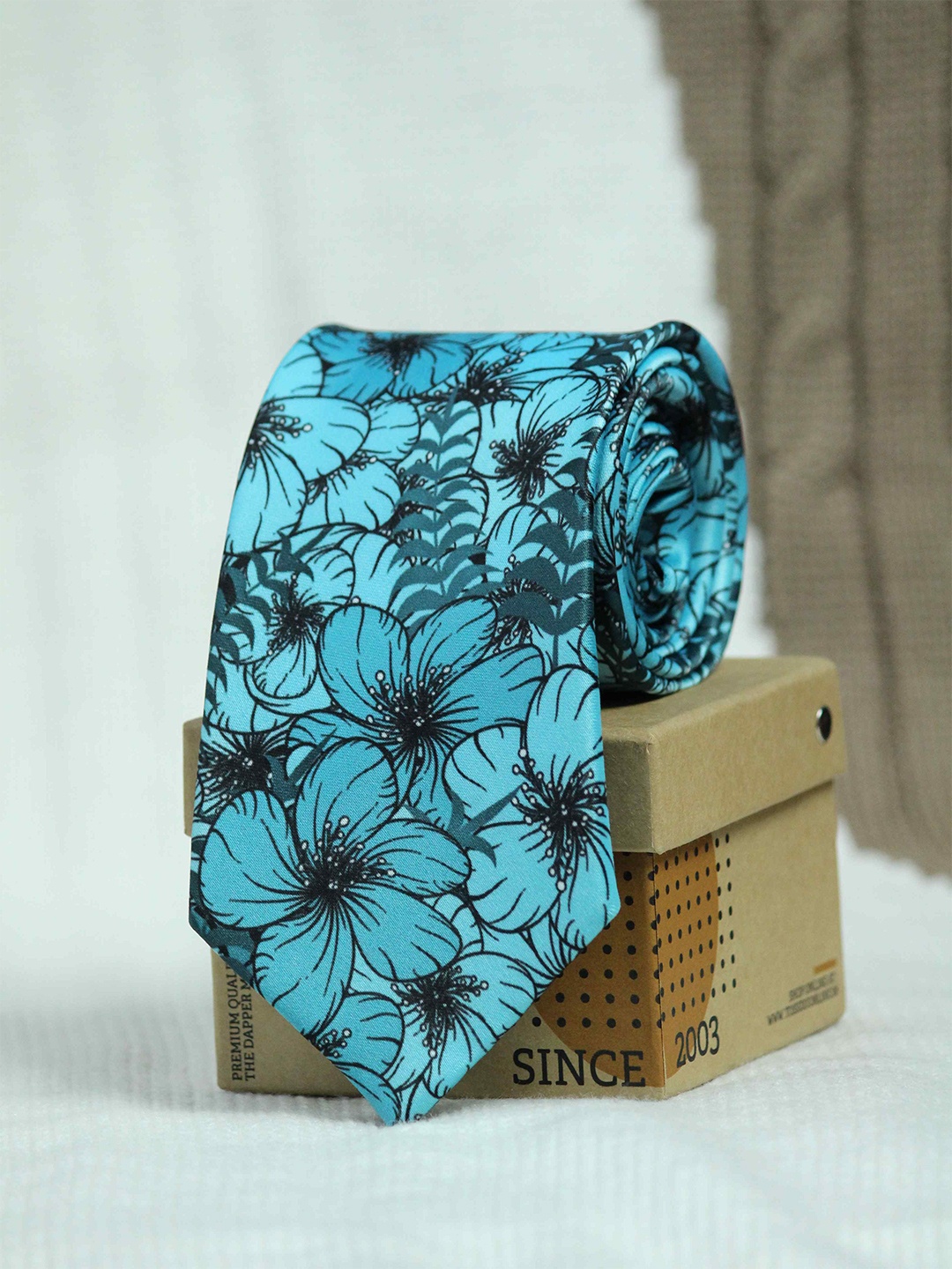 

Tossido Men Blue & Black Printed Broad Tie