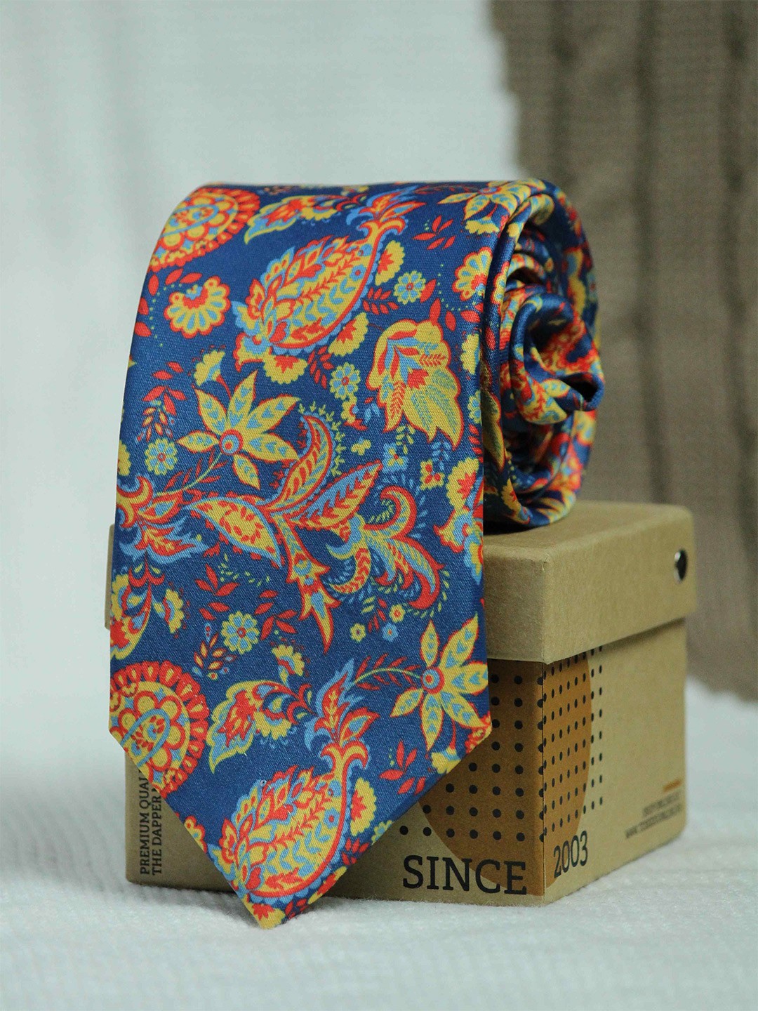 

Tossido Men Blue & Orange Printed Broad Tie