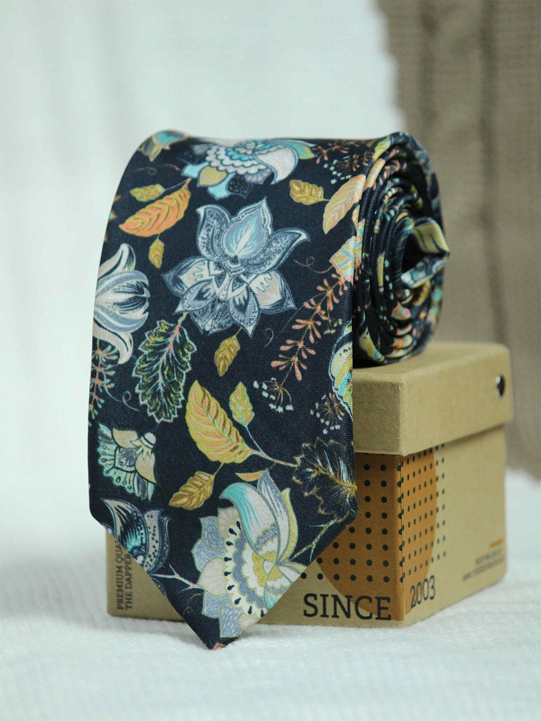 

Tossido Men Black & Blue Printed Broad Tie