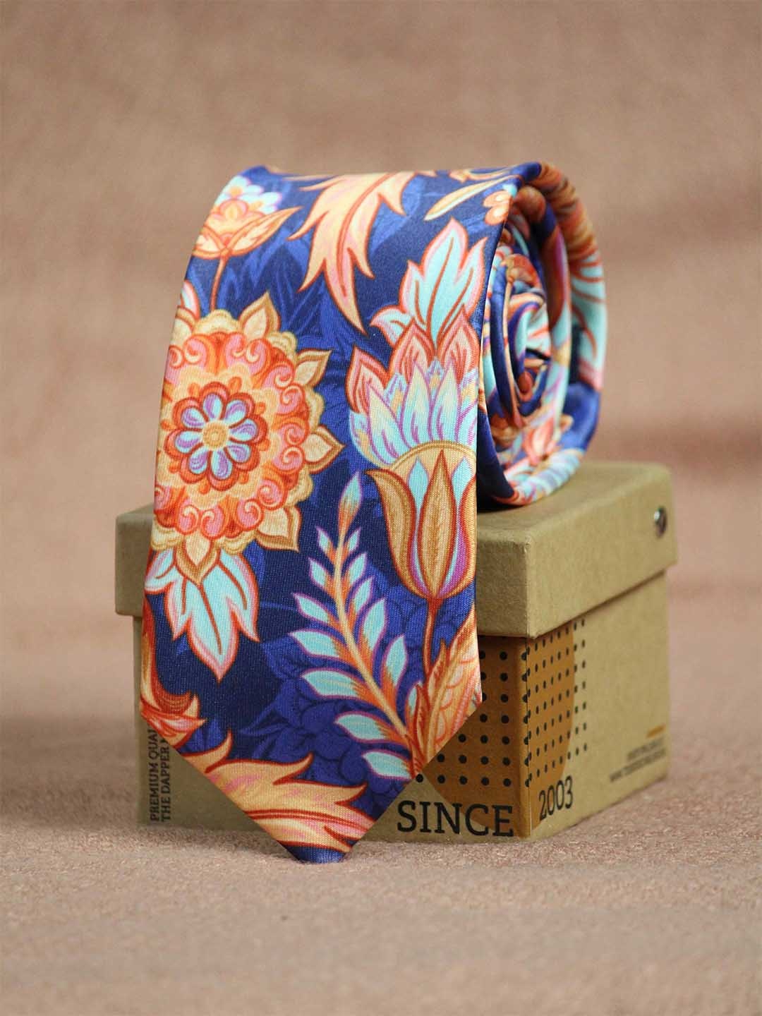 

Tossido Men Blue & Orange Printed Broad Tie
