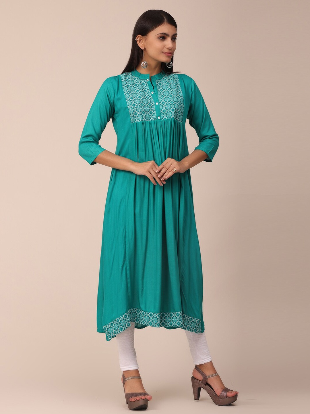 

NAYRA Women Sea Green & White Yoke Design Thread Work A-line Cotton Kurta