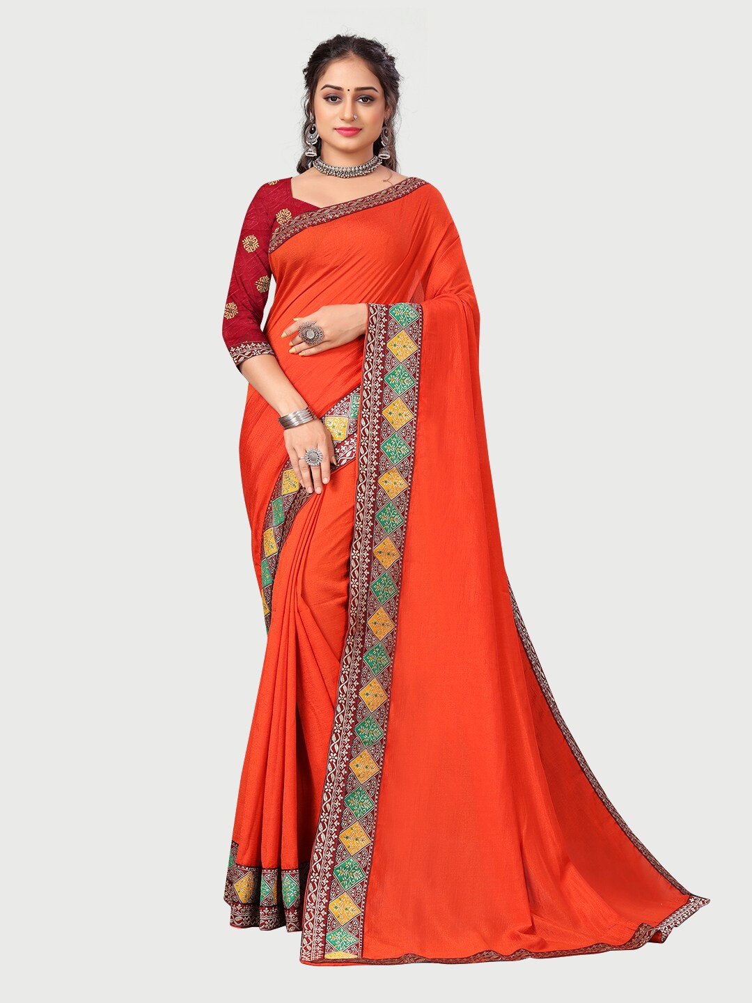 

Mitera Orange & Blue Zari Silk Blend Saree