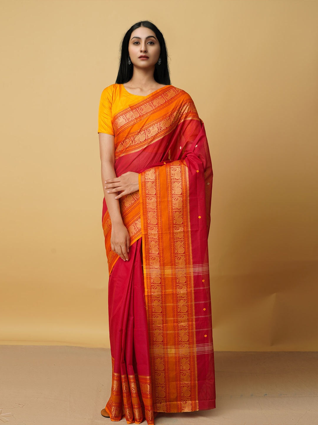 

Unnati Silks Red & Orange Ethnic Motifs Zari Pure Cotton Kanjeevaram Saree