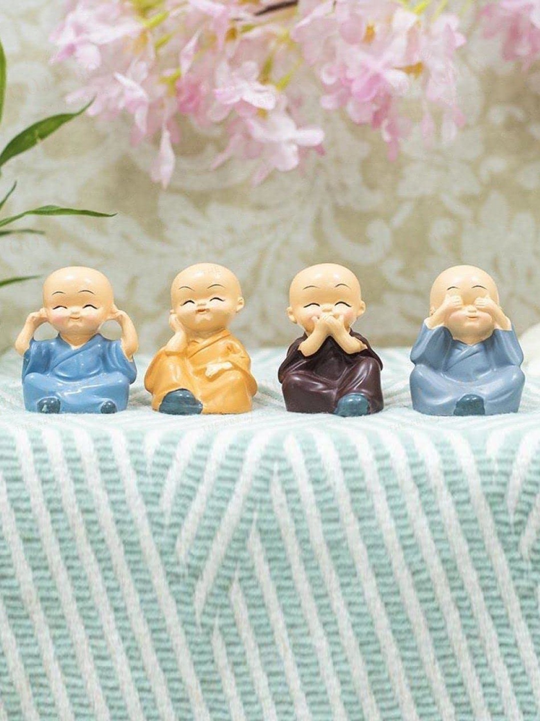 

Perpetual Set of 4 Blue & Yellow Handcrafted Small Monk Buddha Idol Statue Showpiece