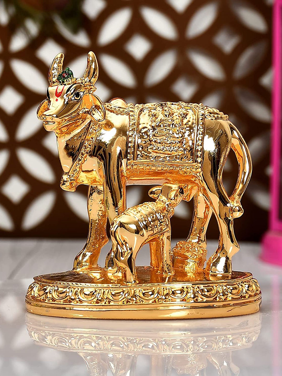

Perpetual Gold Toned Cow and Calf krishna Idol Showpiece