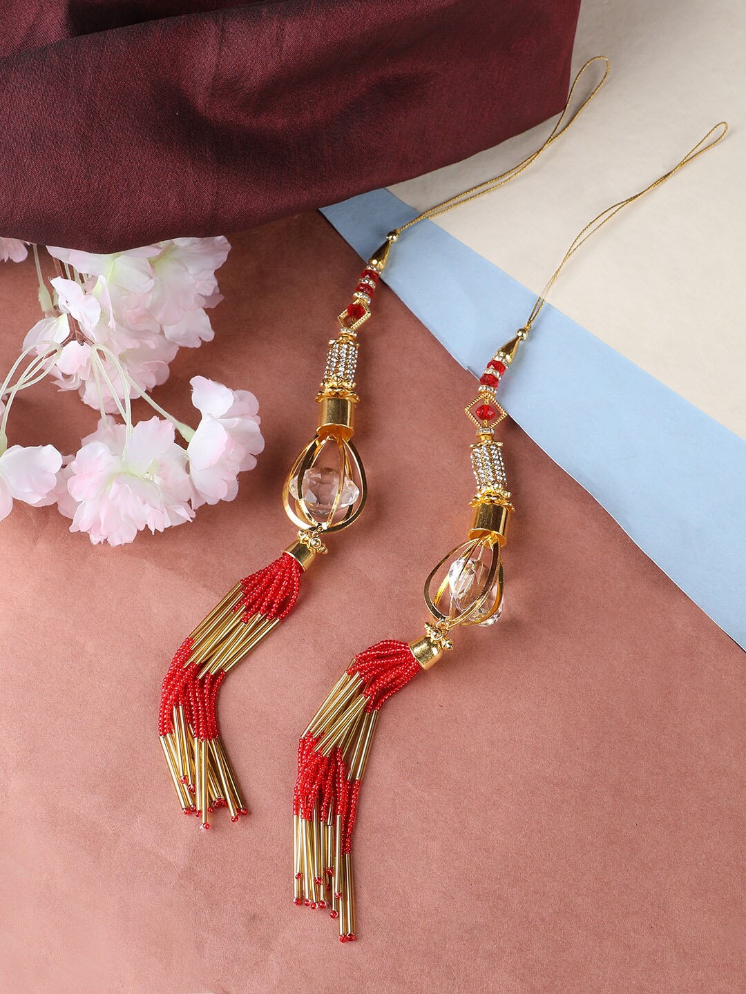 

ANIKAS CREATION Set Of 2 Gold-Plated & Red CZ Studded & Beaded Latkan