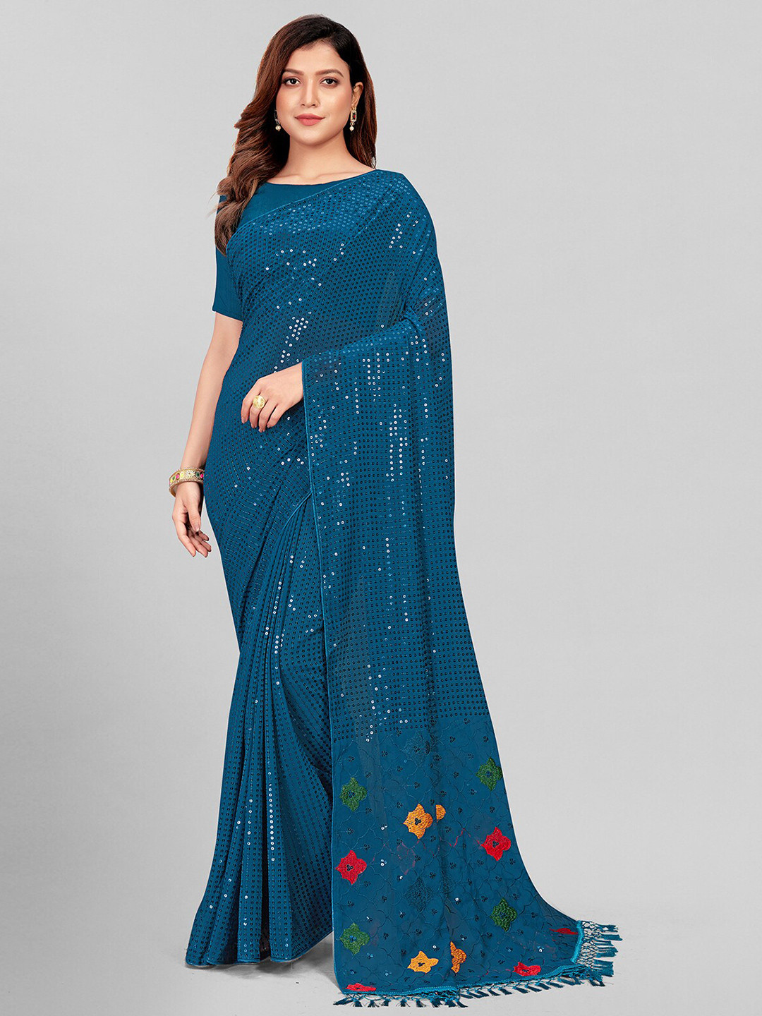 

Granthva Fab Teal & Red Embellished Sequinned Pure Georgette Saree