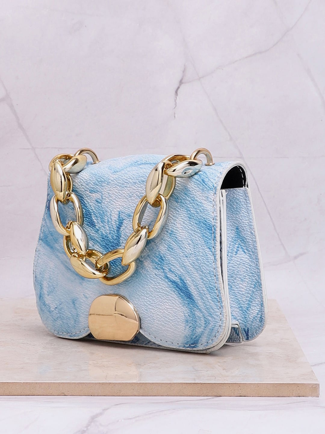 

HAUTE SAUCE by Campus Sutra Blue Printed Handheld Bag