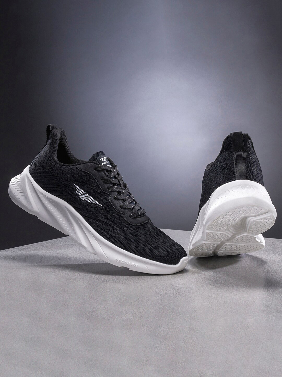 

Red Tape Men Black Textile Walking Shoes