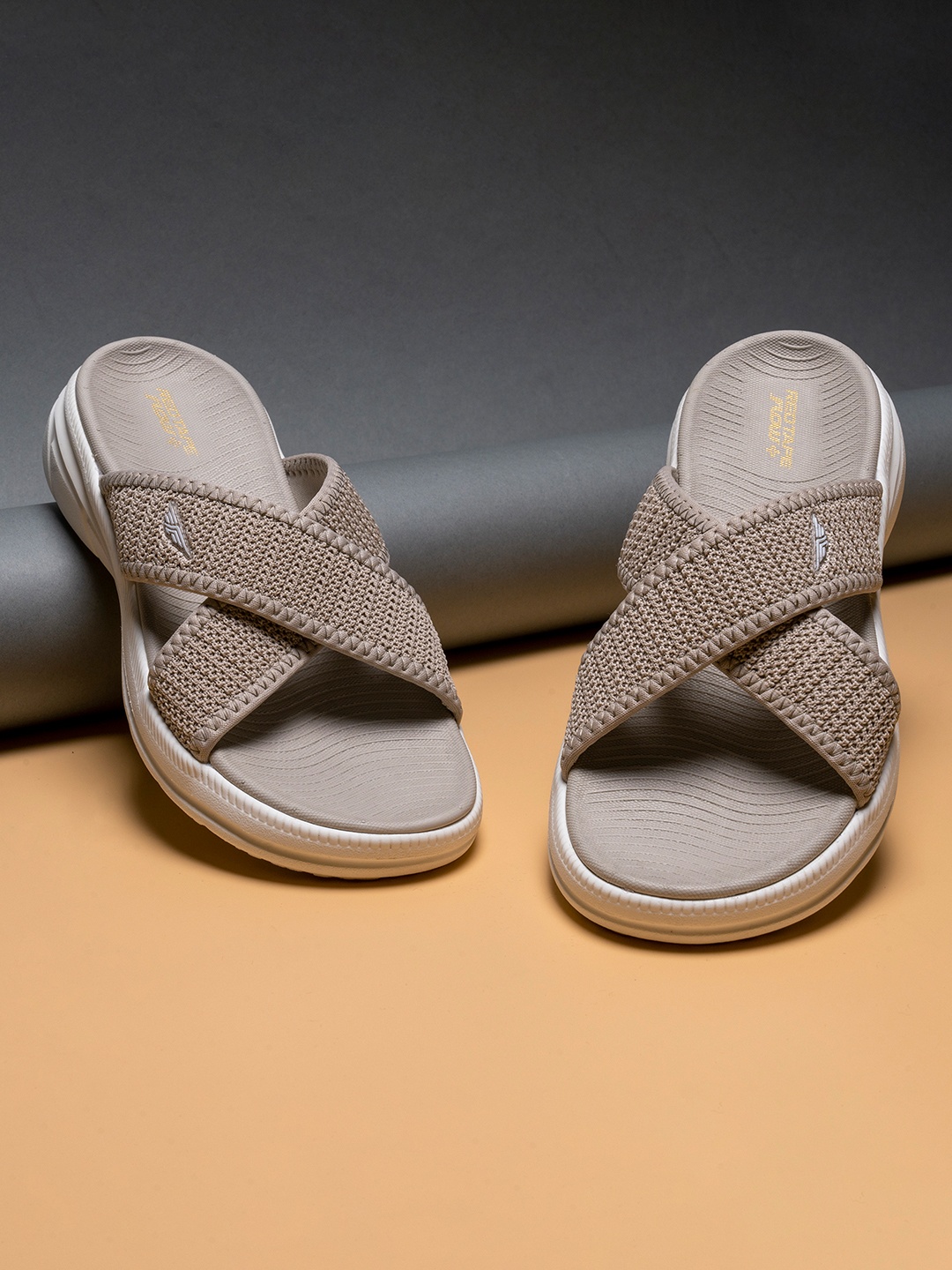 

Red Tape Women Beige & White Rubber Sliders