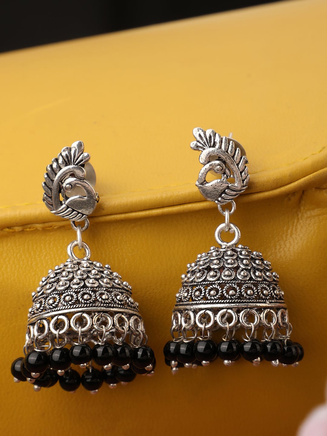 

Bhana Fashion Maroon Silver-Plated Peacock Shaped Jhumkas Earrings