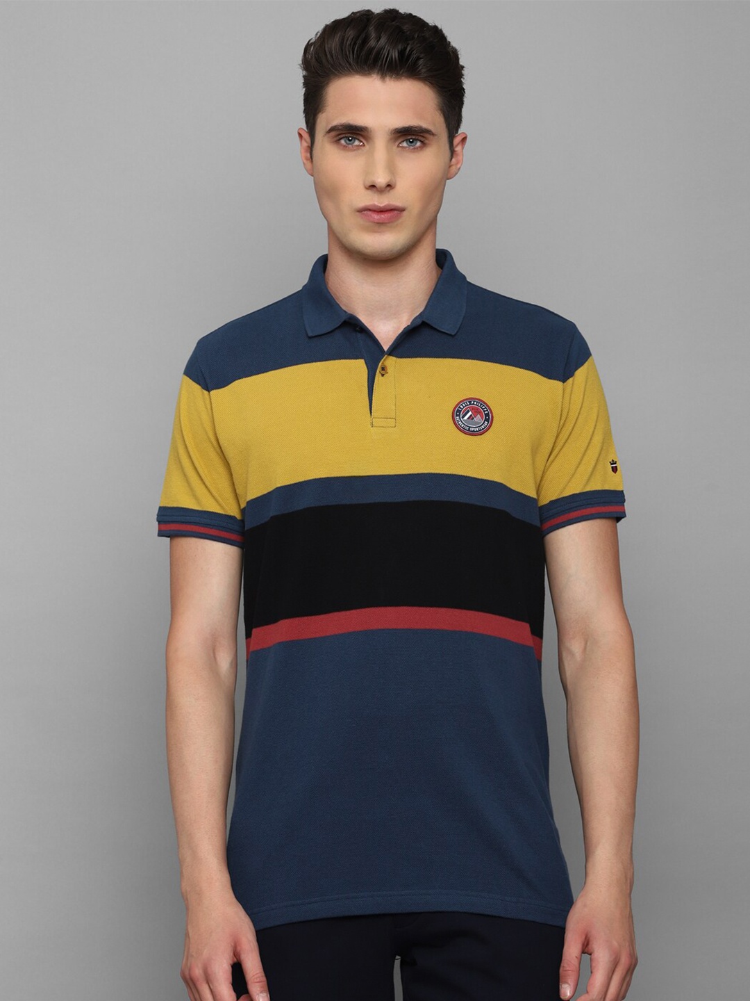 

Louis Philippe Sport Men Blue Striped Polo Collar Applique Slim Fit T-shirt