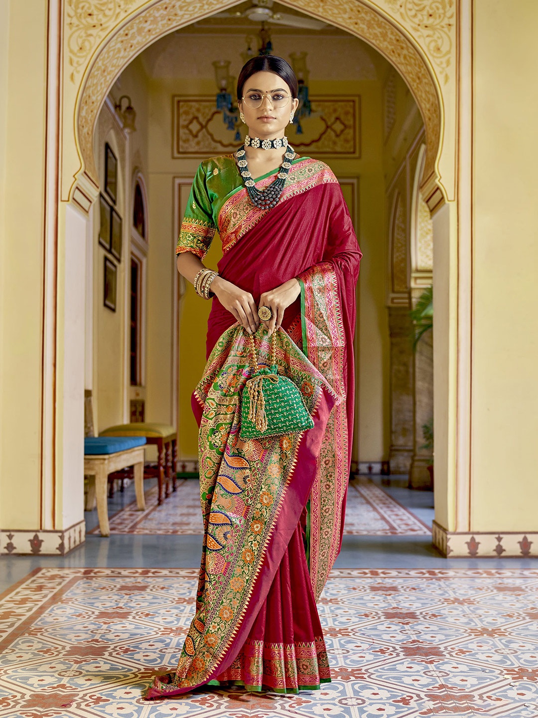 

elora Maroon & Green Ethnic Motifs Zari Saree