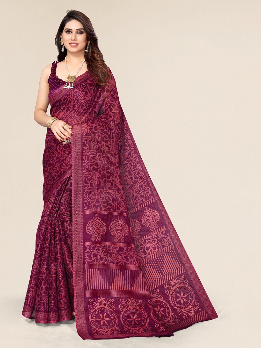 

Winza Designer Magenta Floral Zari Kota Saree