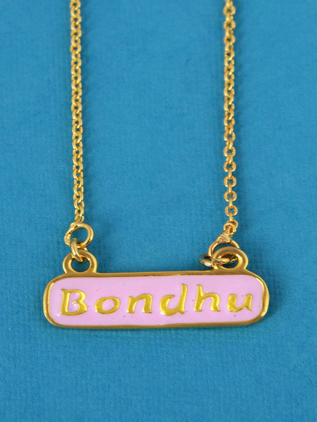 

Tistabene Gold-Plated Pink Typography Carved Pendant
