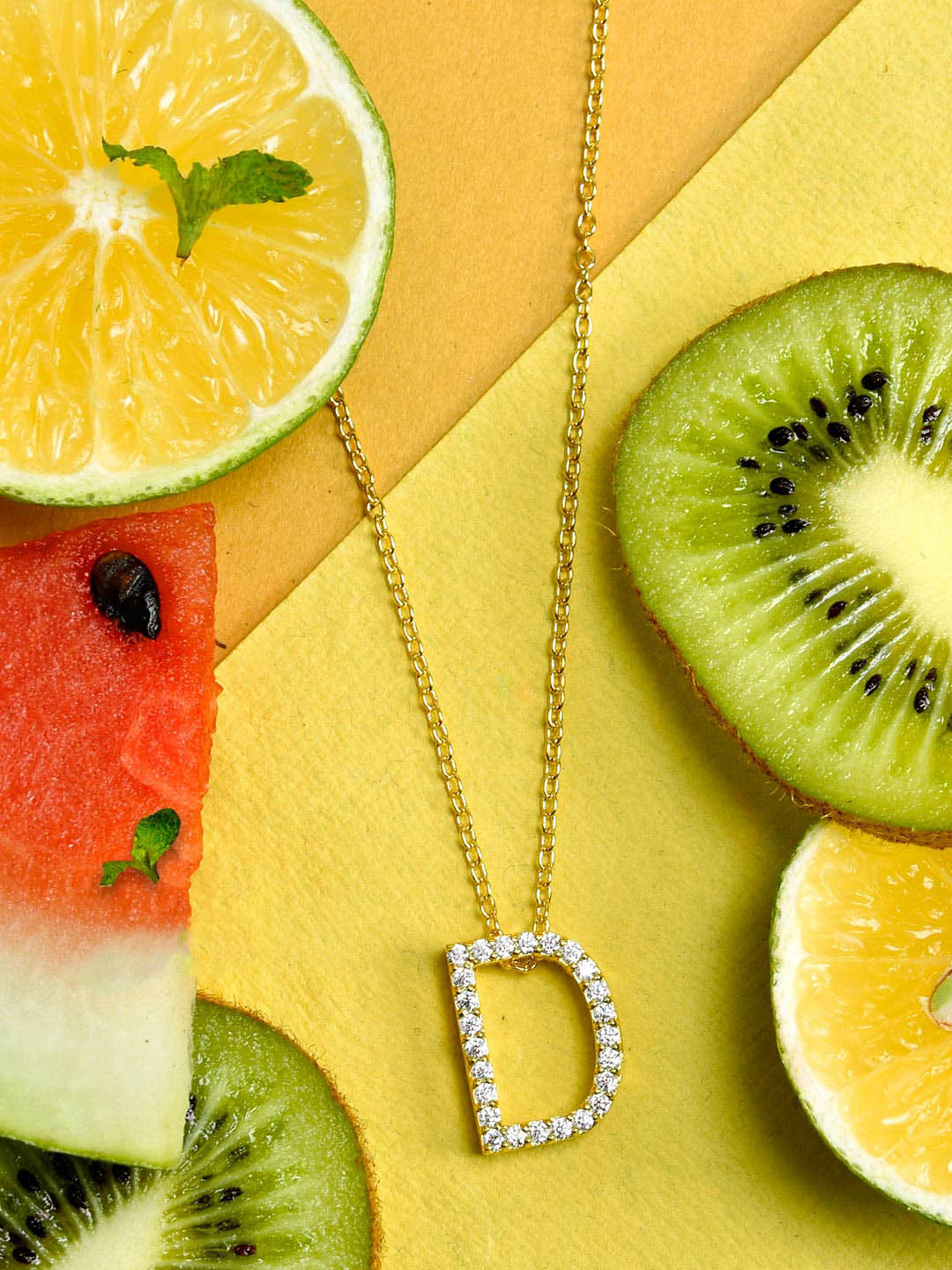 

Tistabene Gold-Plated White AD Studded D Pendant With Chain