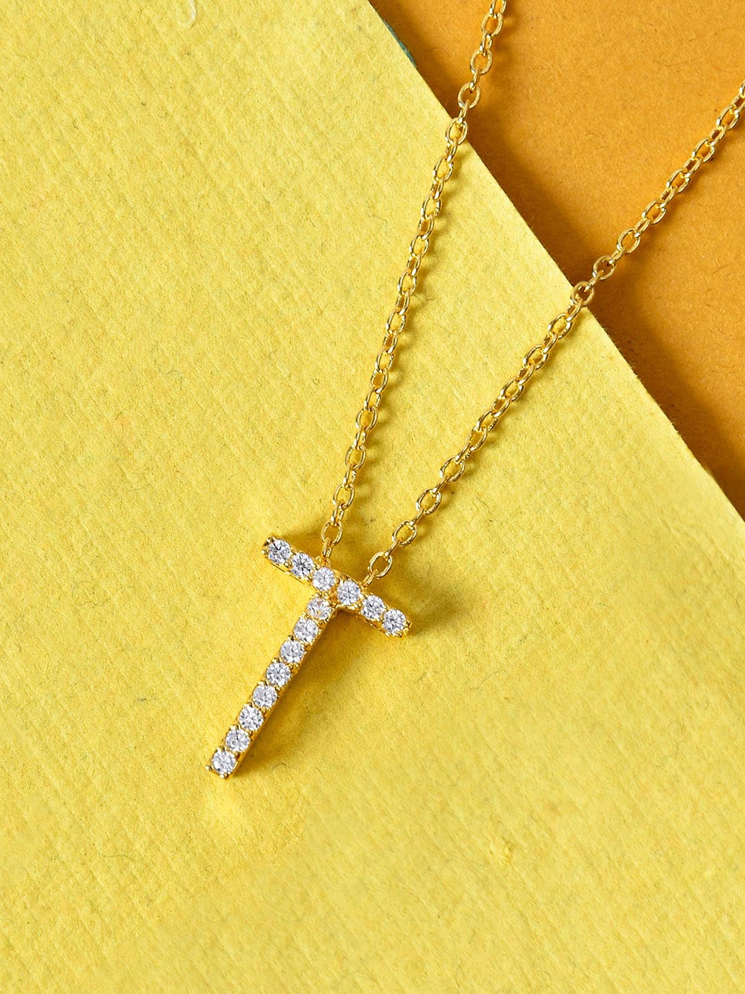 

Tistabene Gold-Plated White AD Studded T Pendant With Chain