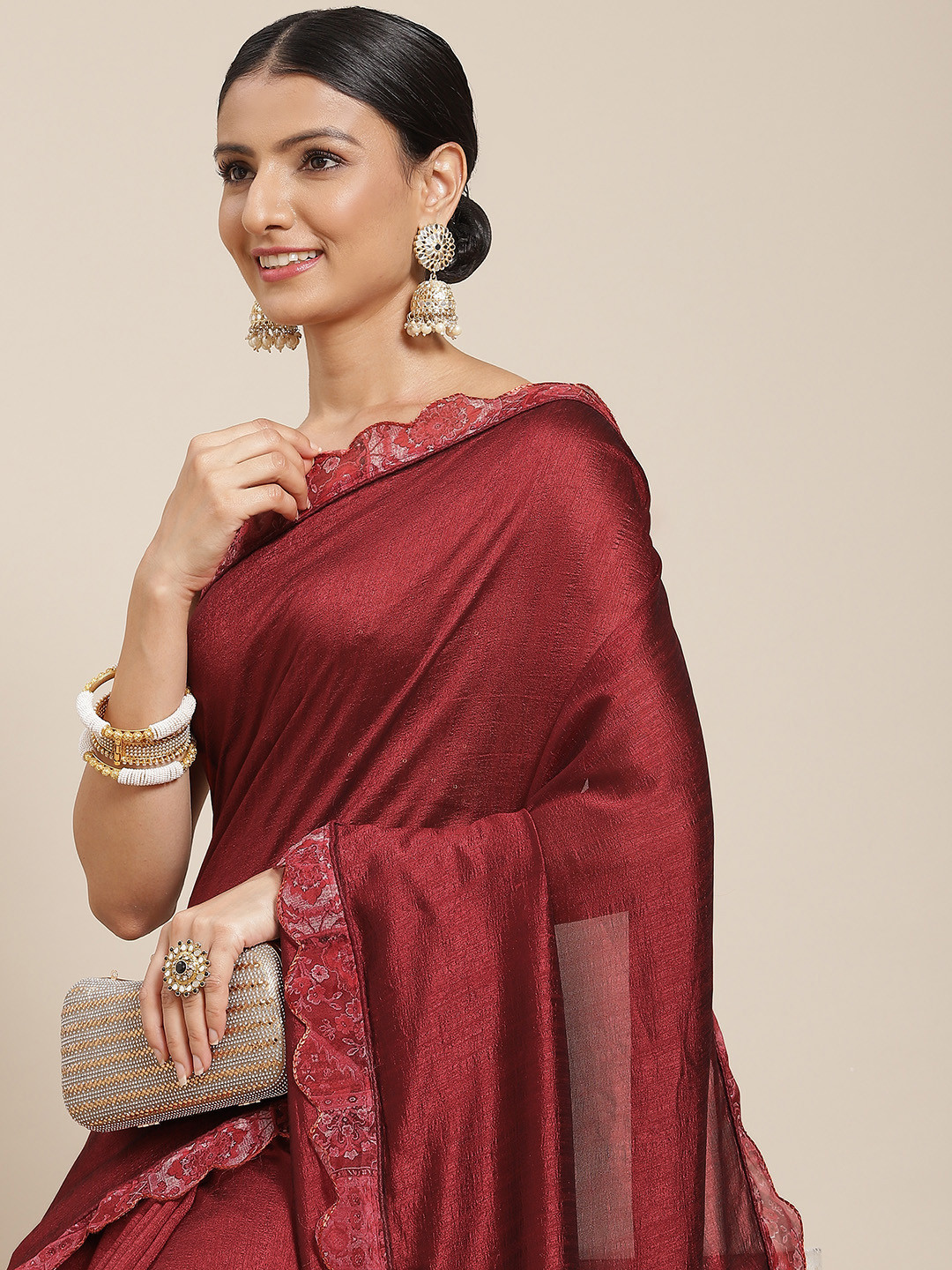

Tikhi Imli Women Maroon Solid Saree