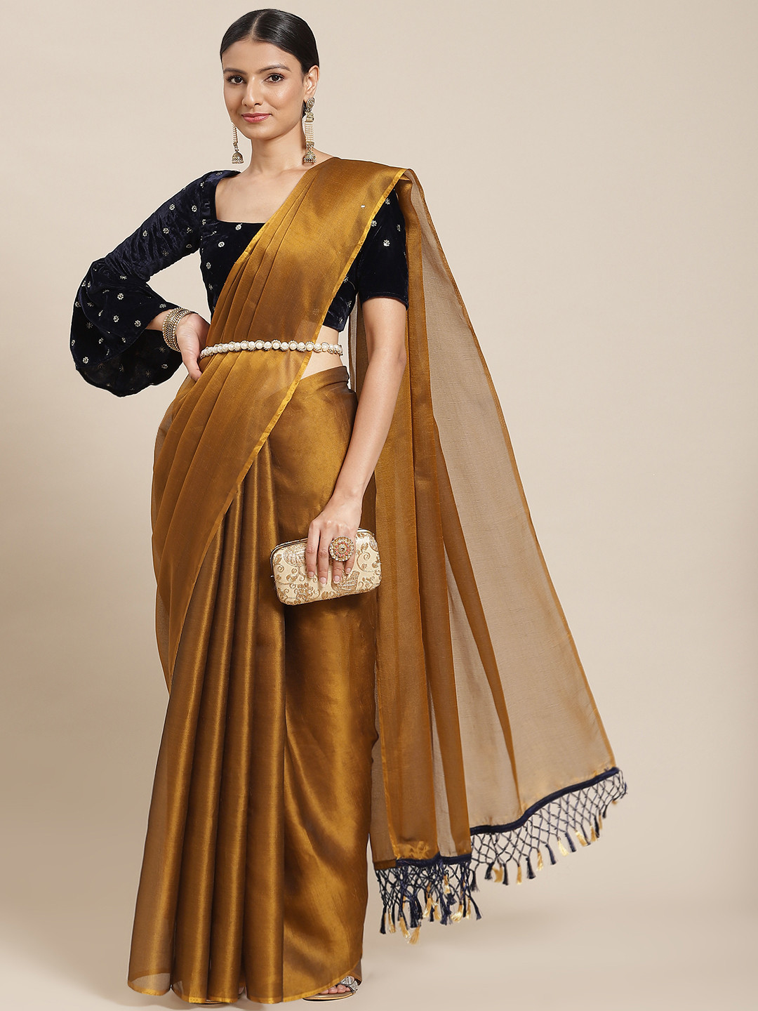 

Tikhi Imli Women Mustard Brown Solid Saree