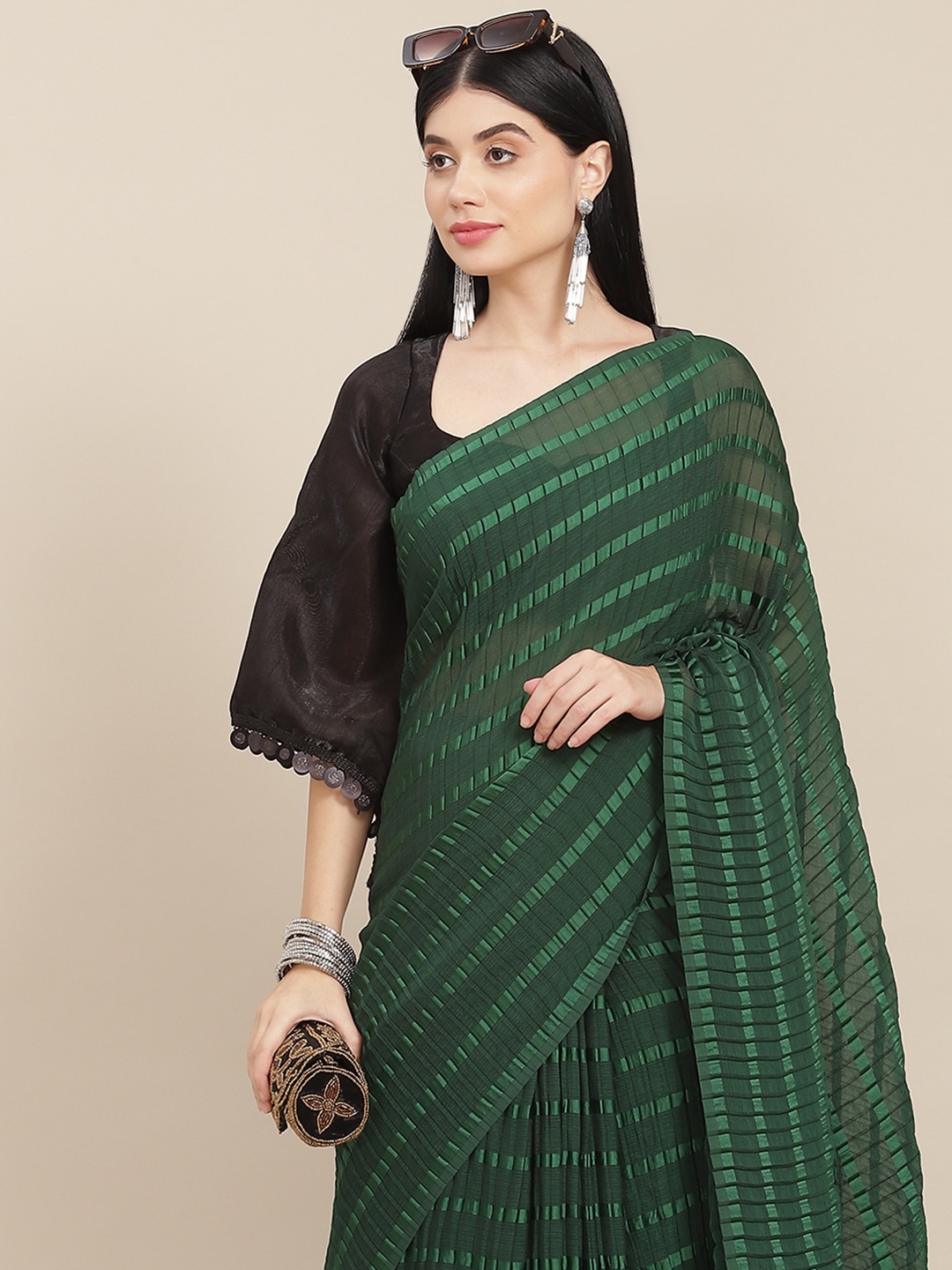 

Tikhi Imli Green Striped Saree