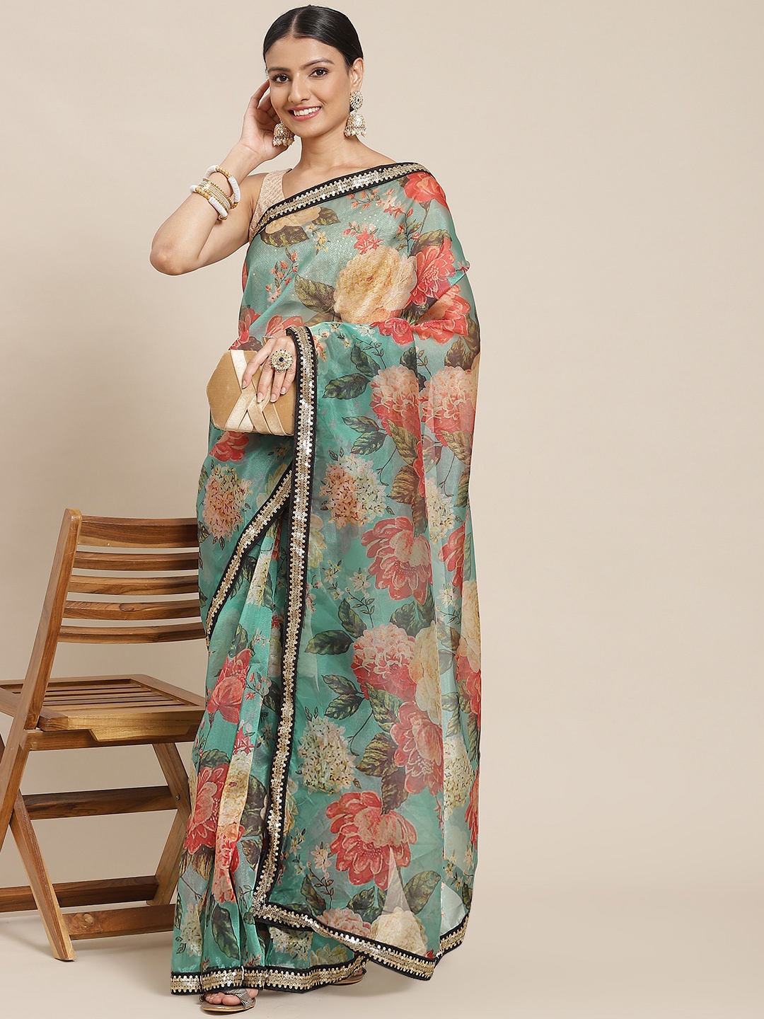

Tikhi Imli Women Sea Green & Red Floral Organza Saree