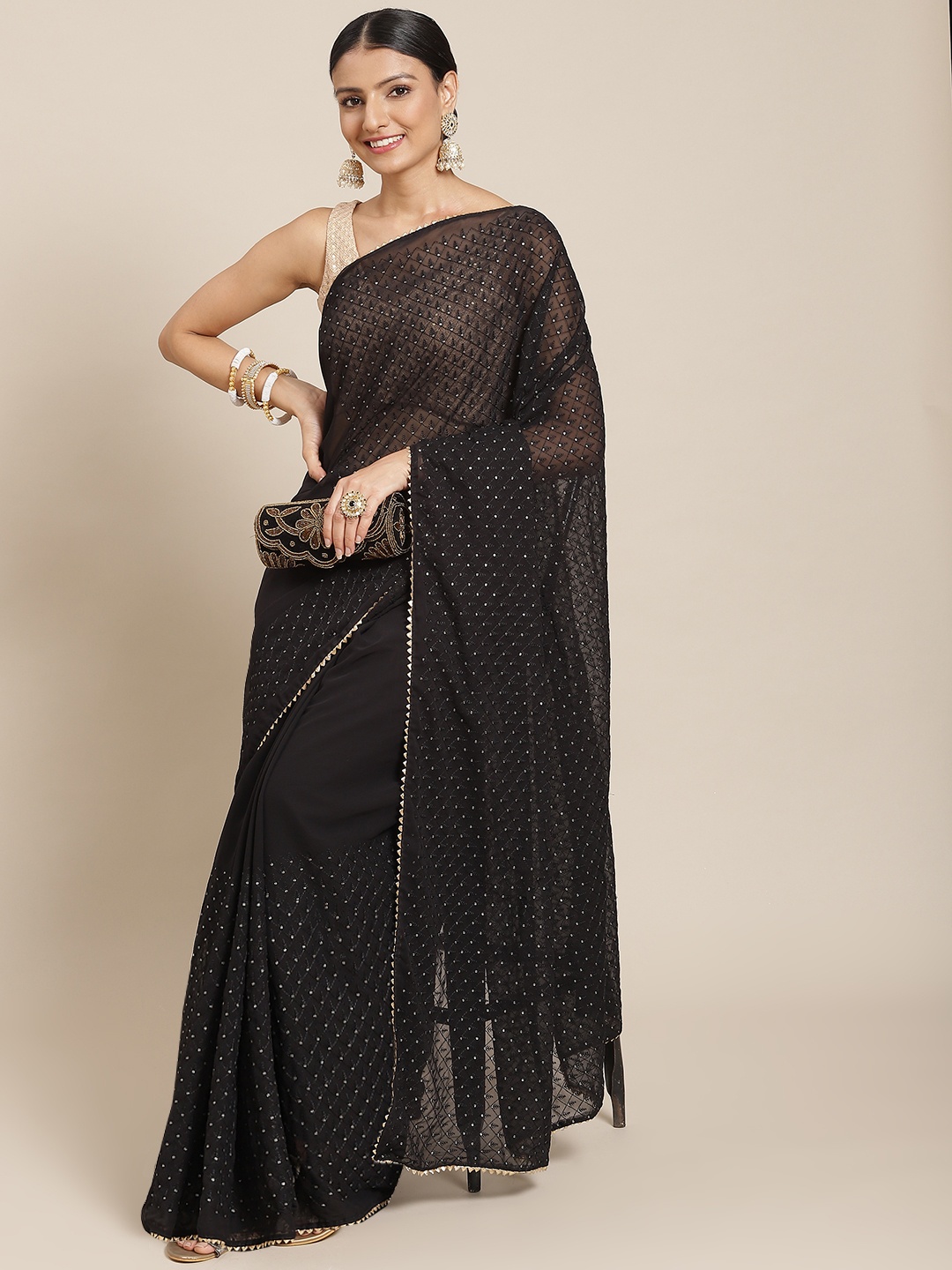 

Tikhi Imli Women Black Ethnic Motifs Sequinned Saree