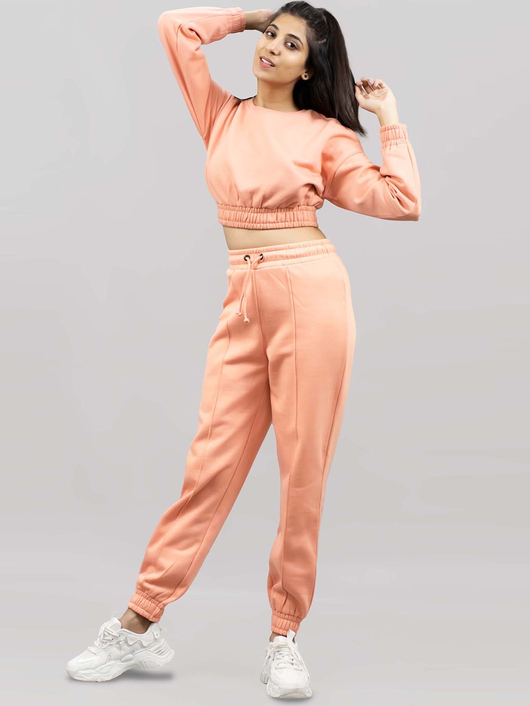 

IMPERATIVE Women Peach Solid 2 Pieces Tracksuit