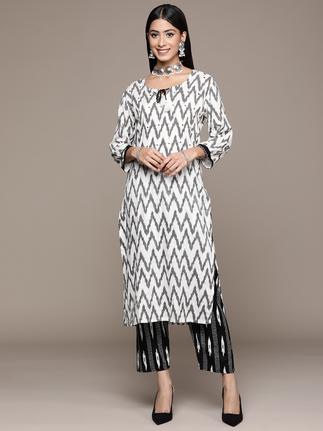 

ZIYAA Women White & Black Printed Mirror Work Kurta with Trousers