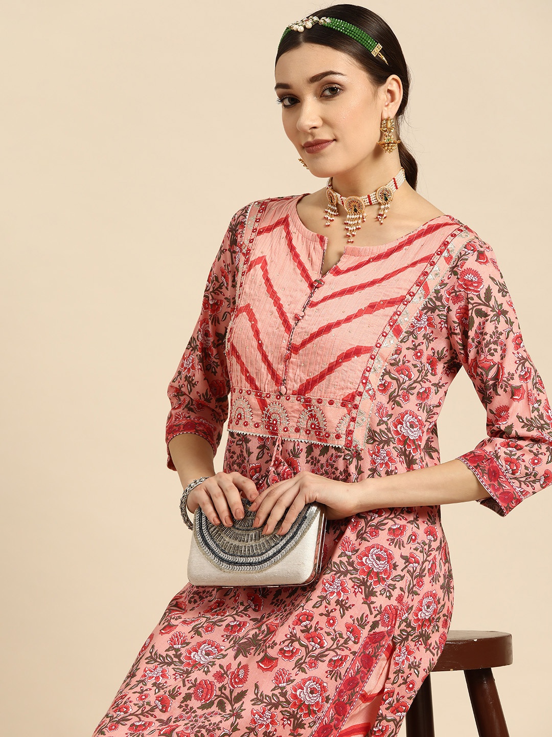 

Sangria Women Peach-Coloured Ethnic Motifs Printed Sequinned Kurta with Trousers