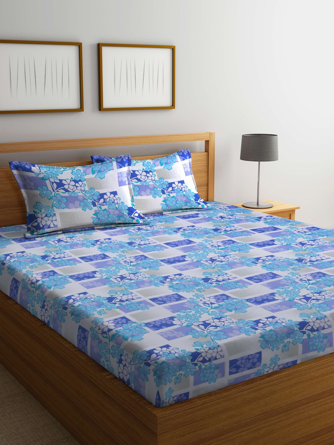 

BOMBAY DYEING Blue & White Floral 120 TC Queen Bedsheet with 2 Pillow Covers