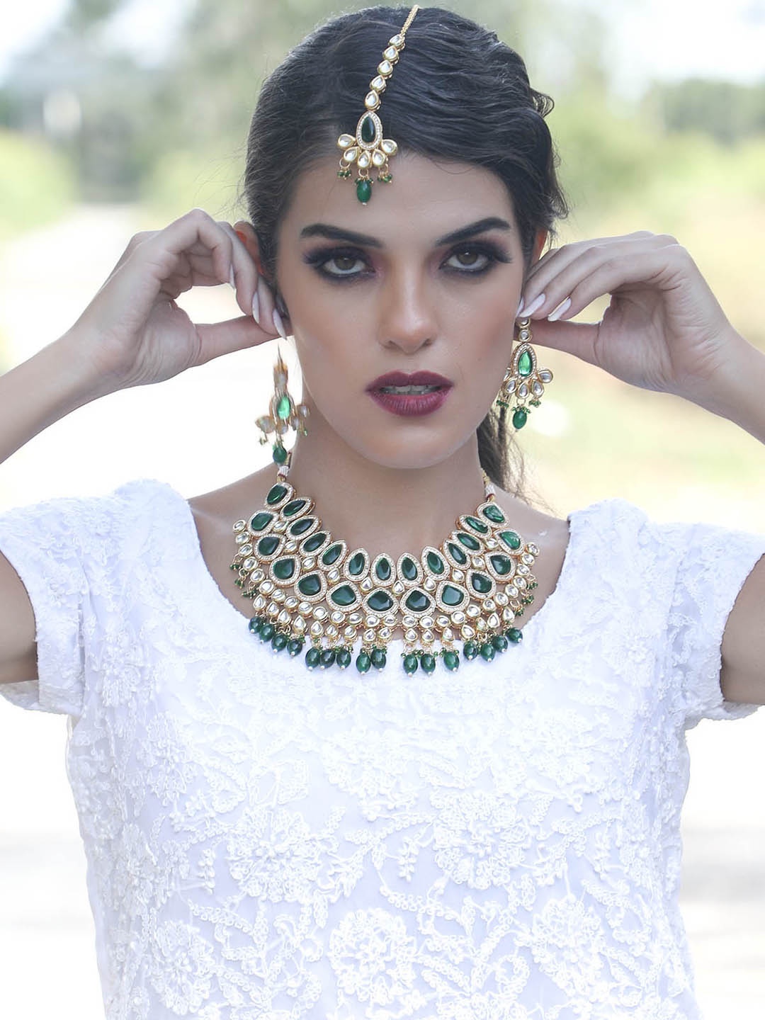 

ODETTE Green & Rhodium Plated Stone Studded & Beaded Jewellery Set