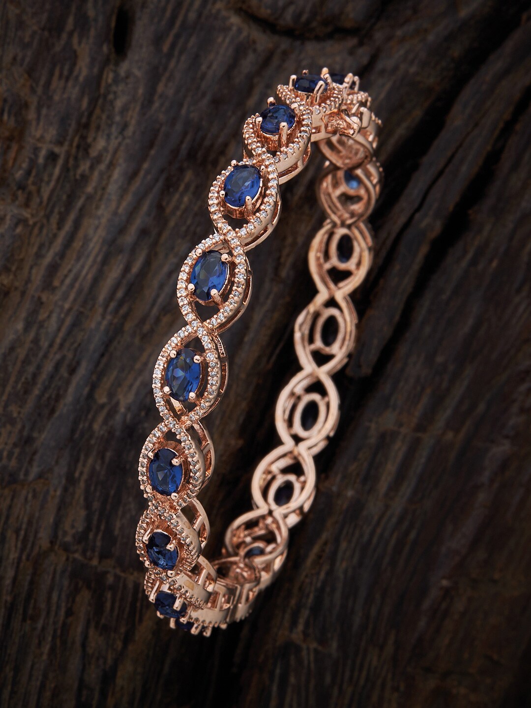 

Kushal's Fashion Jewellery Women Rose Gold Polished Blue CZ Stone Studded Bangle