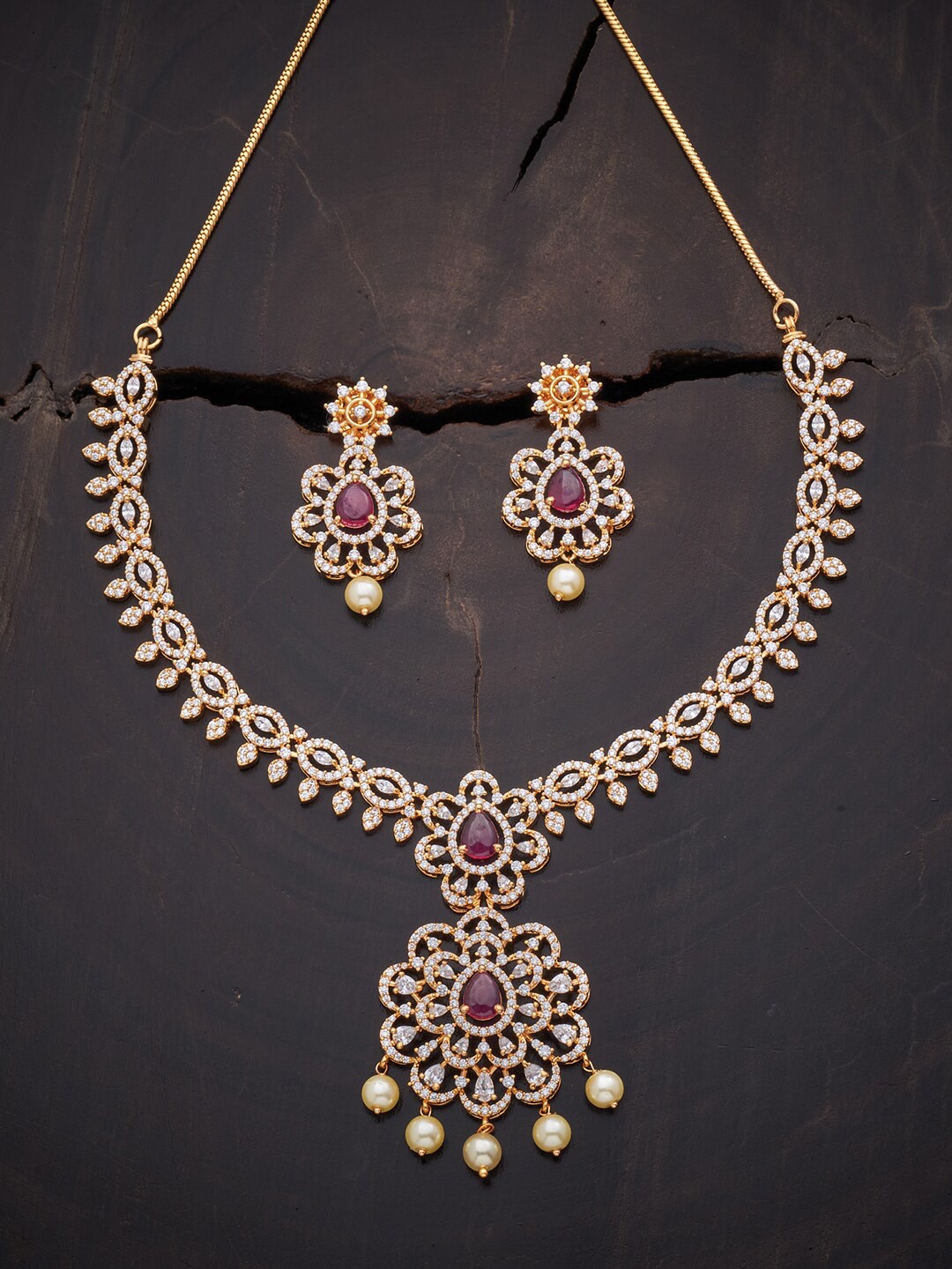 

Kushal's Fashion Jewellery Women Gold Plated Red & White CZ Stone Studded & Beaded Jewellery Set