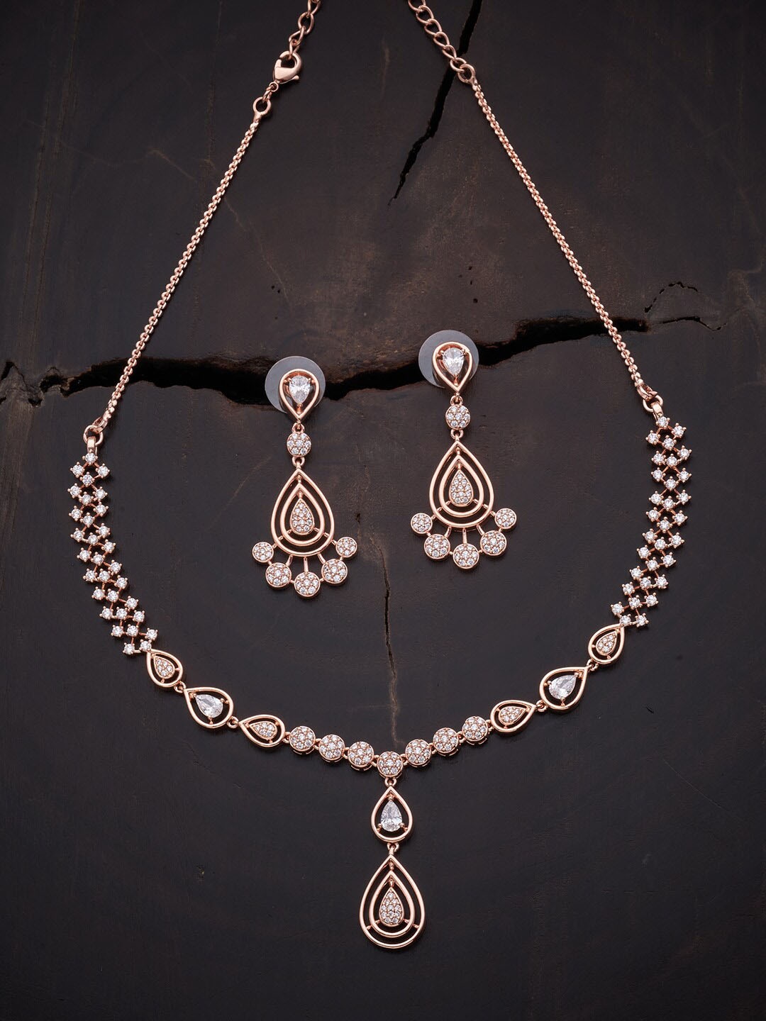 

Kushal's Fashion Jewellery Rose Gold Plated White Necklace with Cubic zirconia Studded Jewellery Set