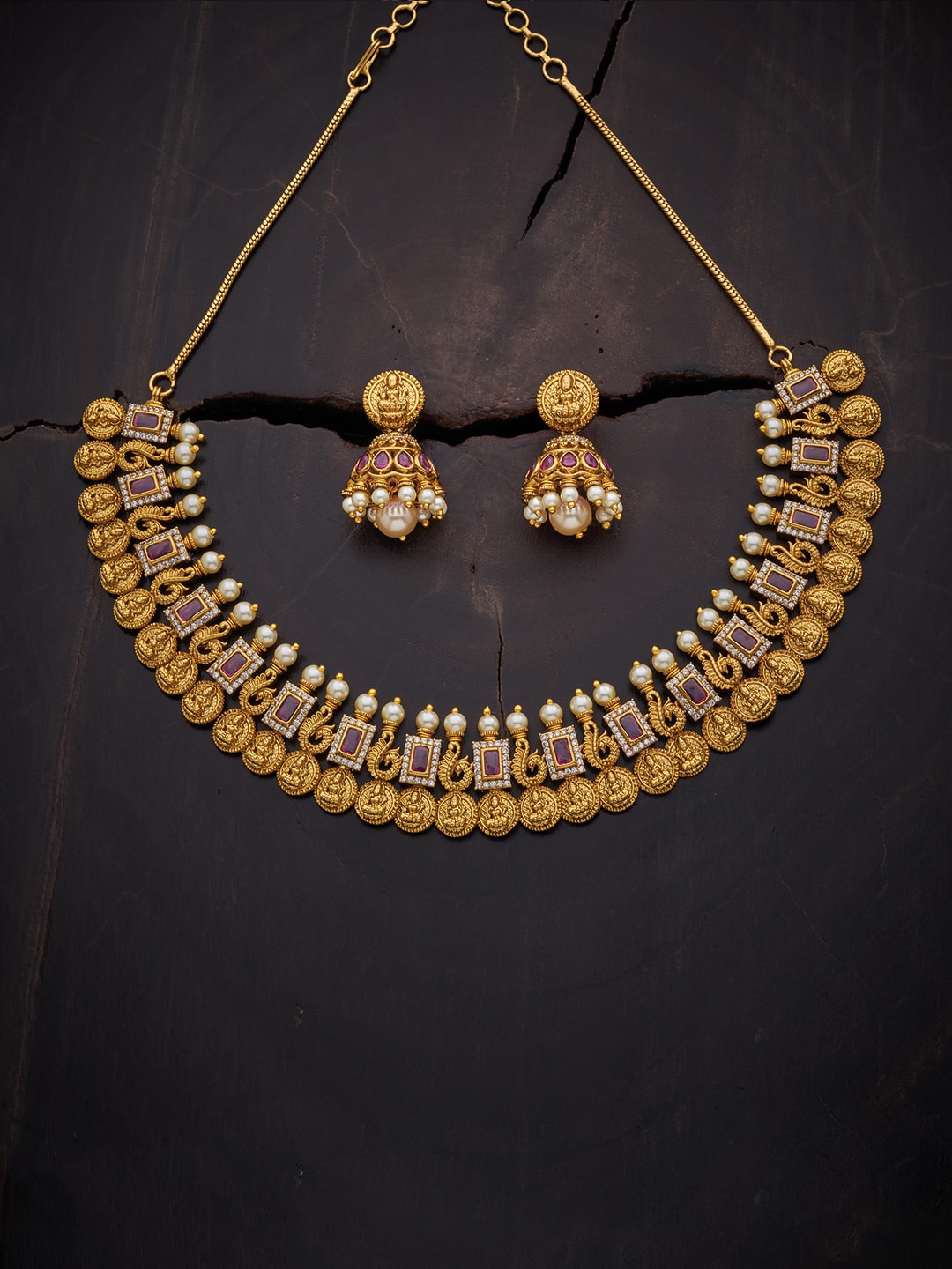 

Kushal's Fashion Jewellery Gold-Toned & Red Stone-Studded & Beaded Jewellery Set