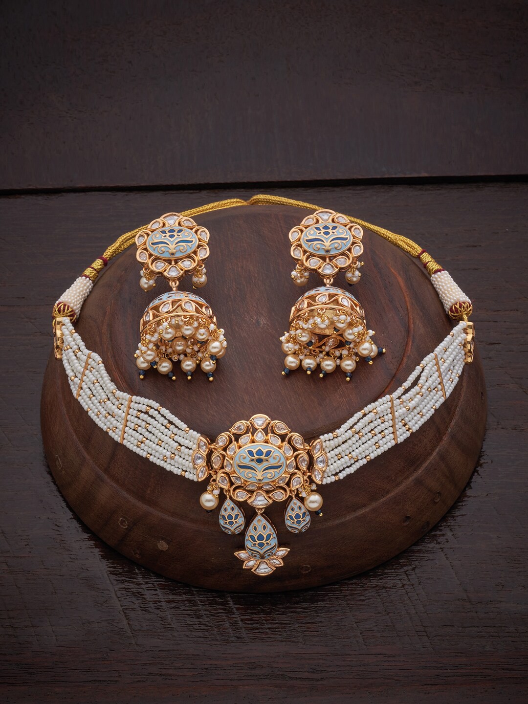 

Kushal's Fashion Jewellery Gold-Toned & Blue Kundan Stone-Studded & Beaded Jewellery Set