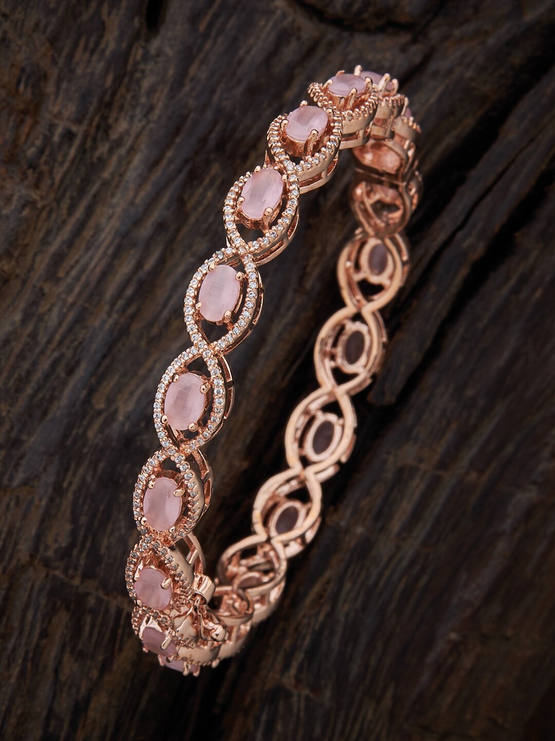

Kushal's Fashion Jewellery Rose Gold-Plated & Toned Pink Artificial Stones Kada Bangle