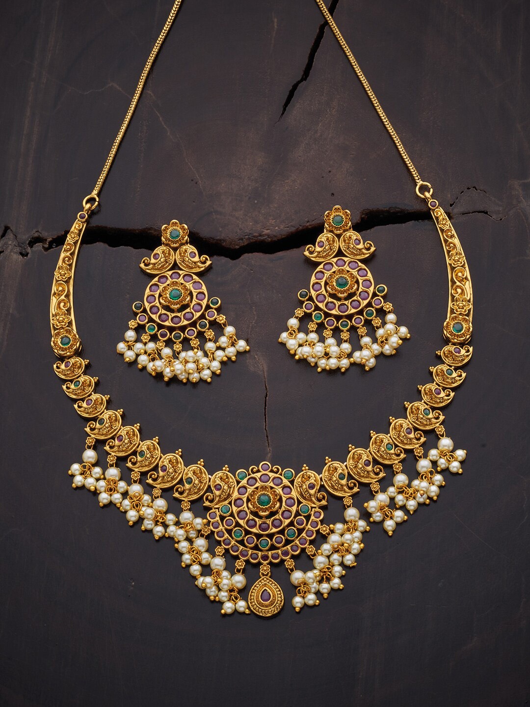 

Kushal's Fashion Jewellery Gold-Toned & Red Stone-Studded & Beaded Jewellery Set